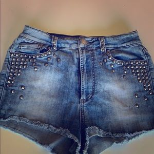 Studded distress denim cut off shorts